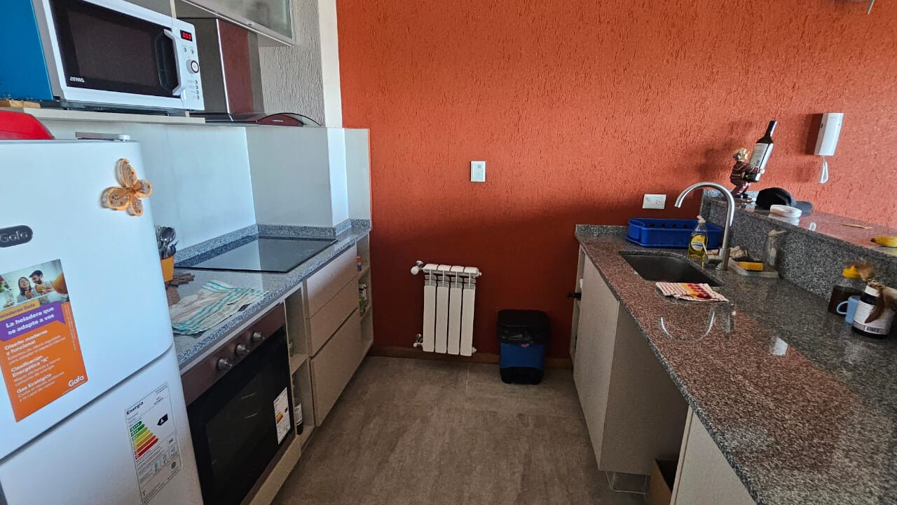 Cocina equipada de departamento en Souls Beach Apart
