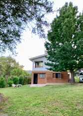 Foto 2 de la galería de CHALET FRENTE AL RIO en Villa Carlos Paz