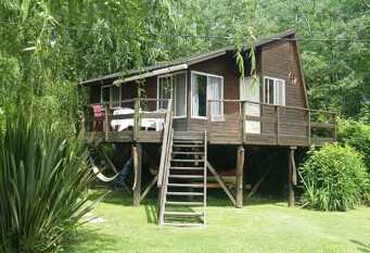 Foto 1 de la galería de Isla Tritón Complejo de Cabañas en Delta del Tigre
