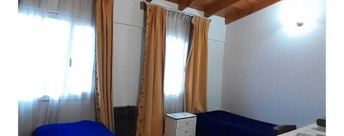 Foto principal de Mini Hostel Canela Habitación disponible en casa cálida. en Puerto Madryn