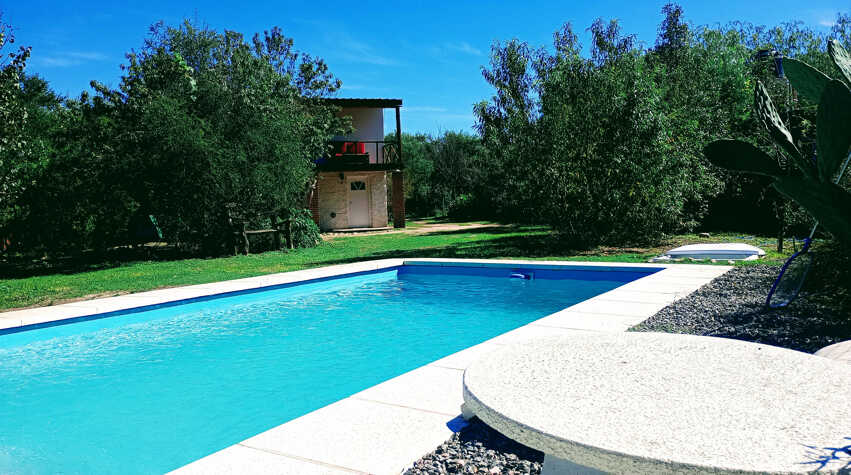 Foto principal de Casa de campo con piscina privada y cabaña con río a 200 met en San Lorenzo