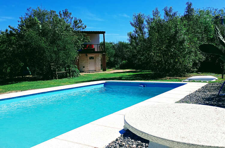 Foto principal de Casa de campo con piscina privada y cabaña con río a 200 met en San Lorenzo