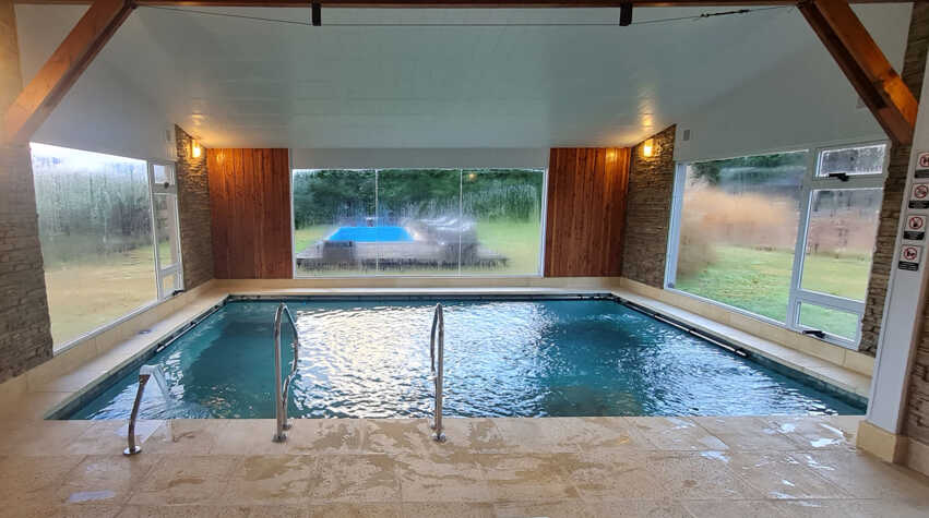 Foto principal de Las Nubes piscina interior y exterior en Las Golondrinas