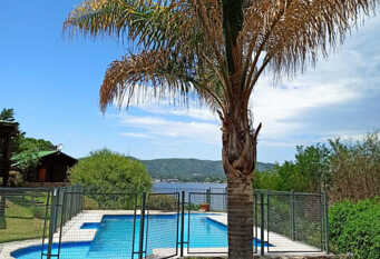 Foto 1 de la galería de El Paraiso , cabañas de tronco con costa sobre el lago. en Villa Santa Cruz Del Lago