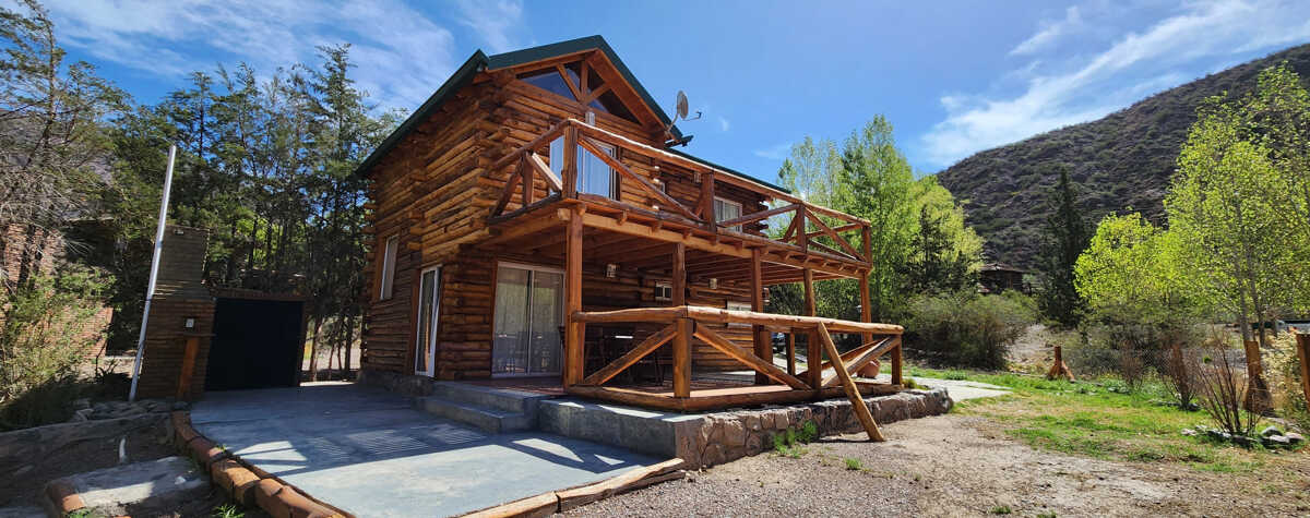 Foto principal de Cabañas Pueblo del Rio en Potrerillos