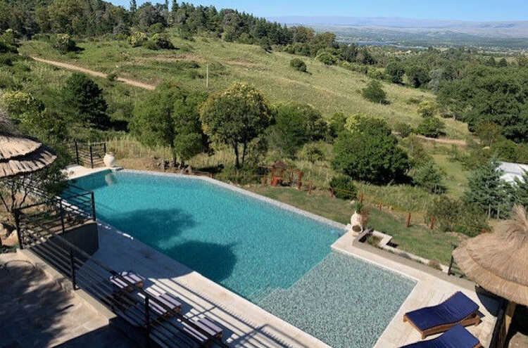 Foto principal de Postal de America Complejo de Cabañas en Villa Ciudad de América