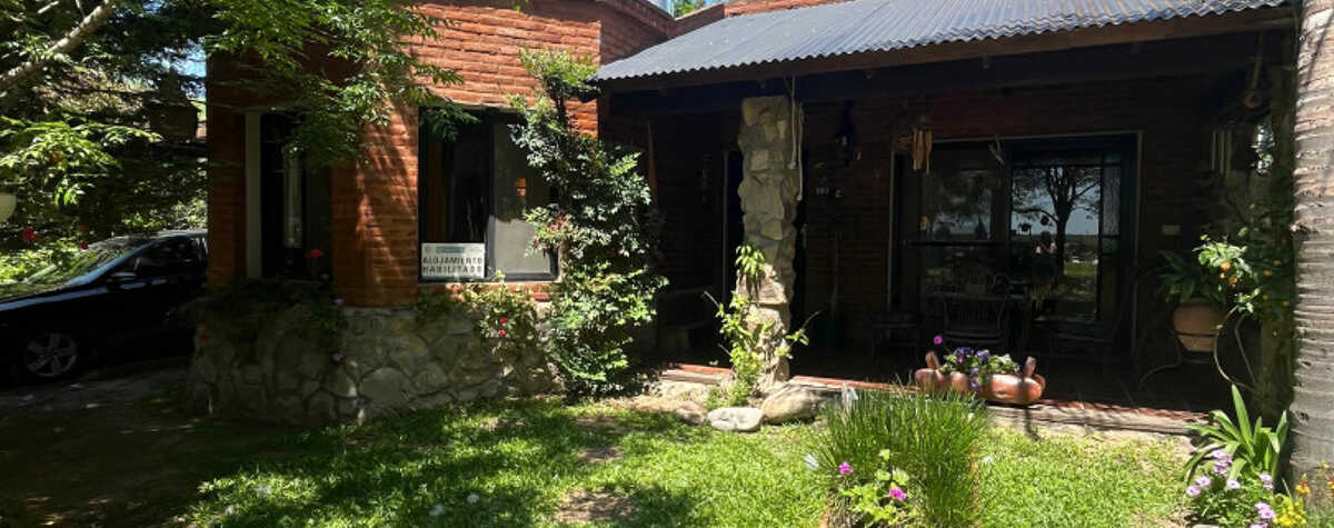 Foto principal de Cabaña de Piedra Mirando el Río en Colón