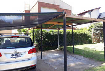 Foto 1 de la galería de Casa Estilo Duplex en Pinamar