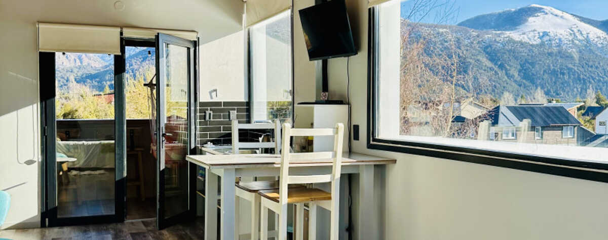 Foto principal de La Casita Del Arbol Bariloche - Vista a las montañas en San Carlos De Bariloche