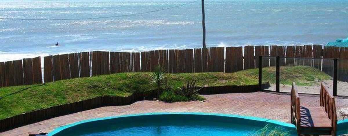 Foto principal de Hosteria Los Troncos en Santa Clara Del Mar